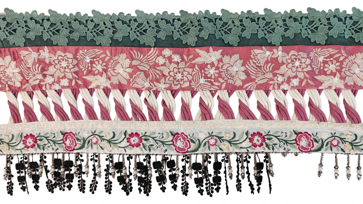 Customized daman design with handmade long twisted dori loop in cream and dusty pink velvet between red and off-white embroidered floral borders with black pearl tassels - Suffuse brand same as model made by Hashtag Happiness expert karigar Faisalabad