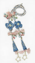 Custom made pearl studded blue cone latkan with pink tassel bow and beaded star charm for designer dresses