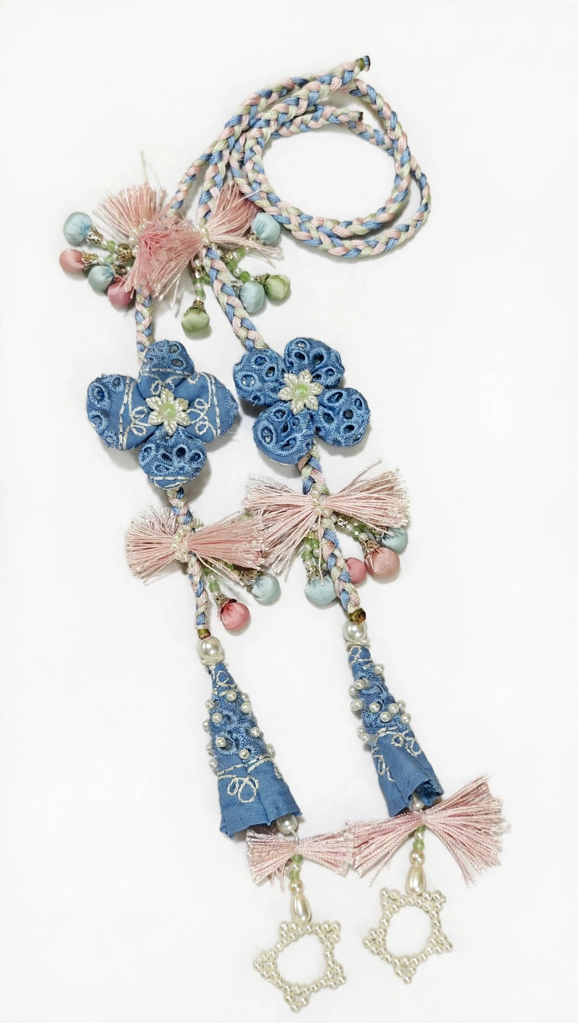 Custom made pearl studded blue cone latkan with pink tassel bow and beaded star charm for designer dresses