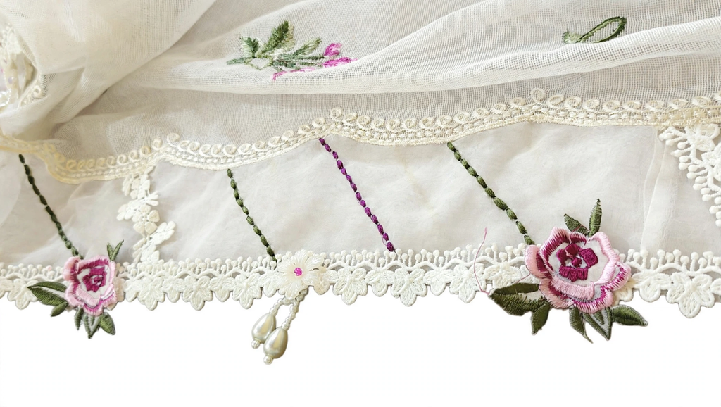 Close-up of organza dupatta border with milky lace pink embroidered rose and pearl latkan tassels handmade by Hashtag Happiness