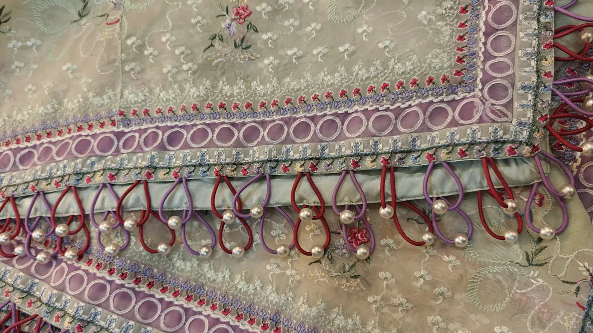 Closeup of 4 side heavy pearl loop border on embroidered mint organza dupatta - Hashtag Happiness original design