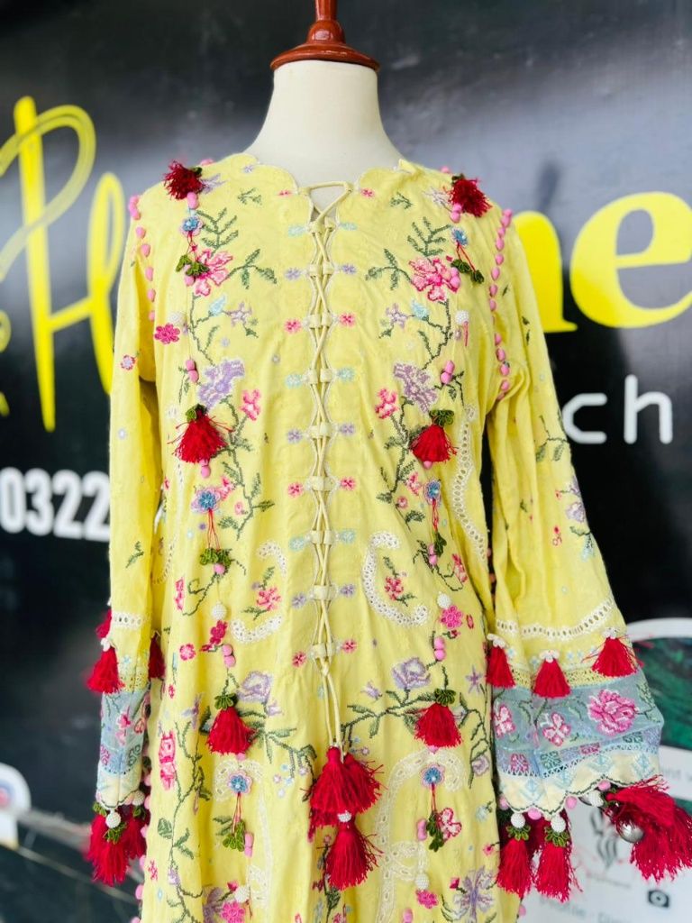 Zaha yellow embroidered suit stitched by Hashtag Happiness with custom front tassels