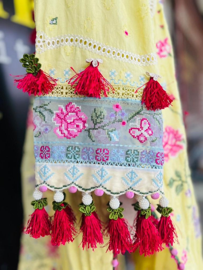 Zaha suit sleeves with organza patch and custom hanging resham thread tassels